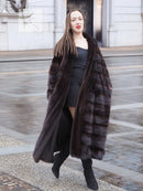 Dark mink fur coat with horizontal stripe texture and open, draped front