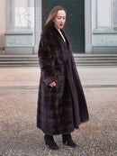 Dark brown mink fur coat with horizontal stripe pattern and long straight silhouette
