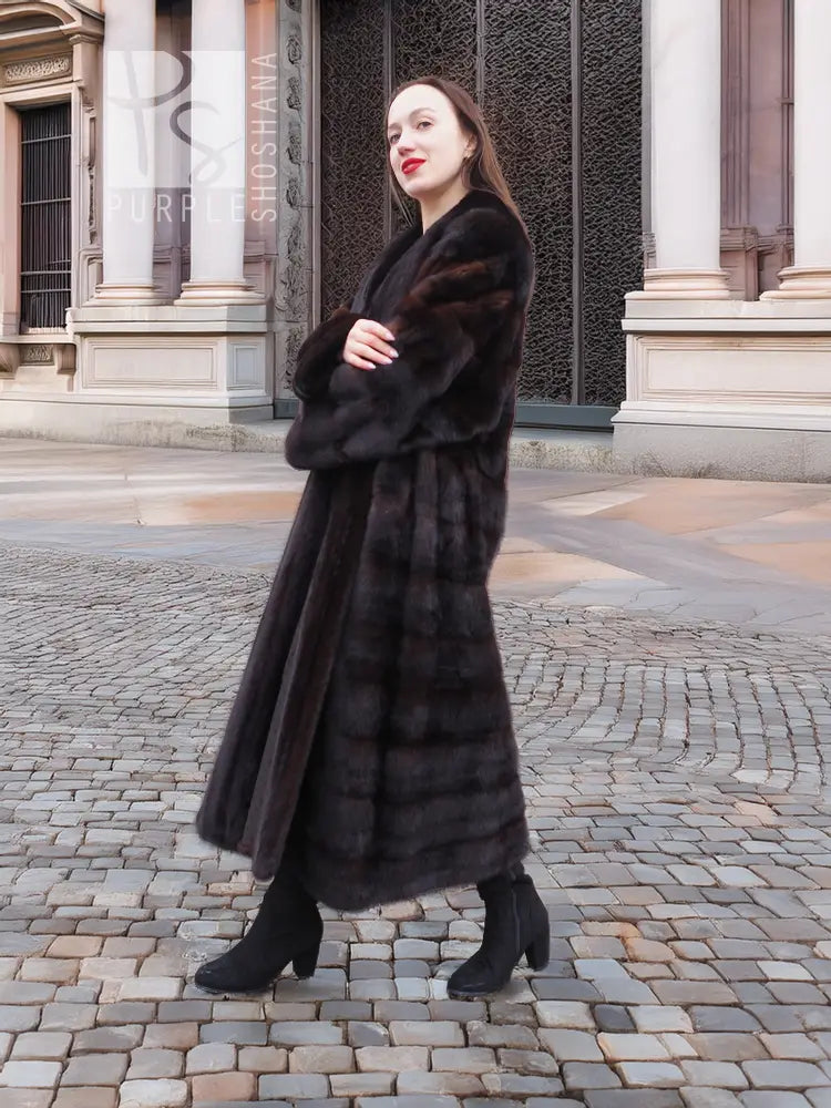 Dark brown mink fur coat with wide collar, wrap-like tuxedo front, and straight hem