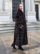 Dark brown mink fur tuxedo coat with horizontal stripe design and long sleeves