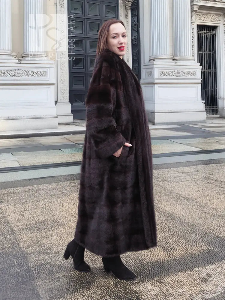 Dark brown mink fur tuxedo coat with horizontal stripe design and long sleeves