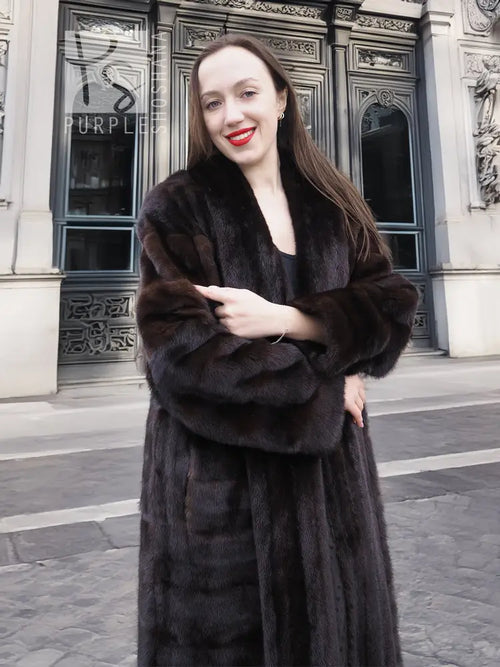 Dark brown mink fur coat with tuxedo lapels, long sleeves, and horizontal stripe pattern