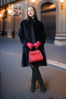 Midnight Iris sheared beaver coat, dark navy, buttoned placket, straight long silhouette.