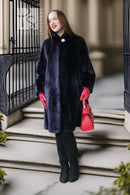Midnight Iris coat in dark navy sheared beaver, front button, stand collar, textured fabric.