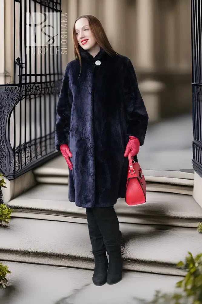 Midnight Iris coat in dark navy sheared beaver, front button, stand collar, textured fabric.