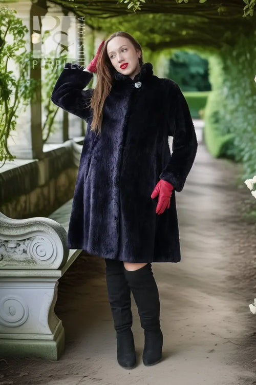Midnight Iris sheared beaver coat, dark navy, stand collar button, long sleeves, A-line hem.