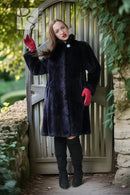 Midnight Iris coat in dark navy, high collar hood, round silver button