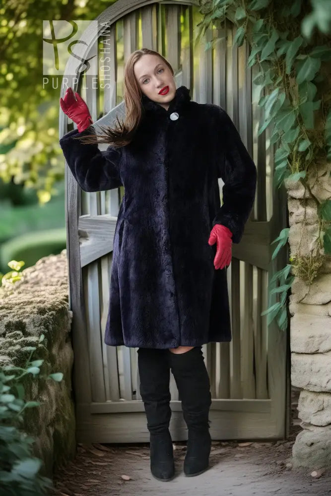 Midnight Iris coat in dark navy, high collar hood, round silver button