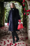 Midnight Iris sheared beaver coat, dark navy, stand collar, front button, knee-length.