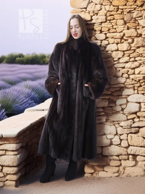 Black mink maxi coat with high collar and long, flowing sleeves
