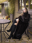 Black mink long coat with plush lapels and relaxed drape