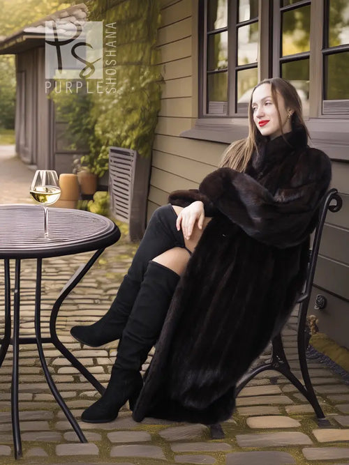 Black mink long coat with plush lapels and relaxed drape