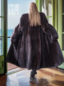 Black mink long coat, back view with flared hem