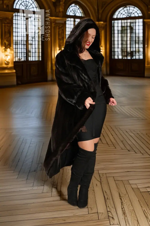 Black hooded mink coat with wide sleeves and long length, front view