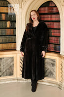 Black hooded mink coat standing front view, long silhouette, button closure