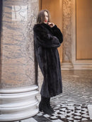 Black mink coat with wide fur collar and long sleeves, full-length hem