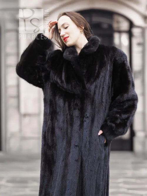 Black mink coat with raised fur collar and hood, buttoned front