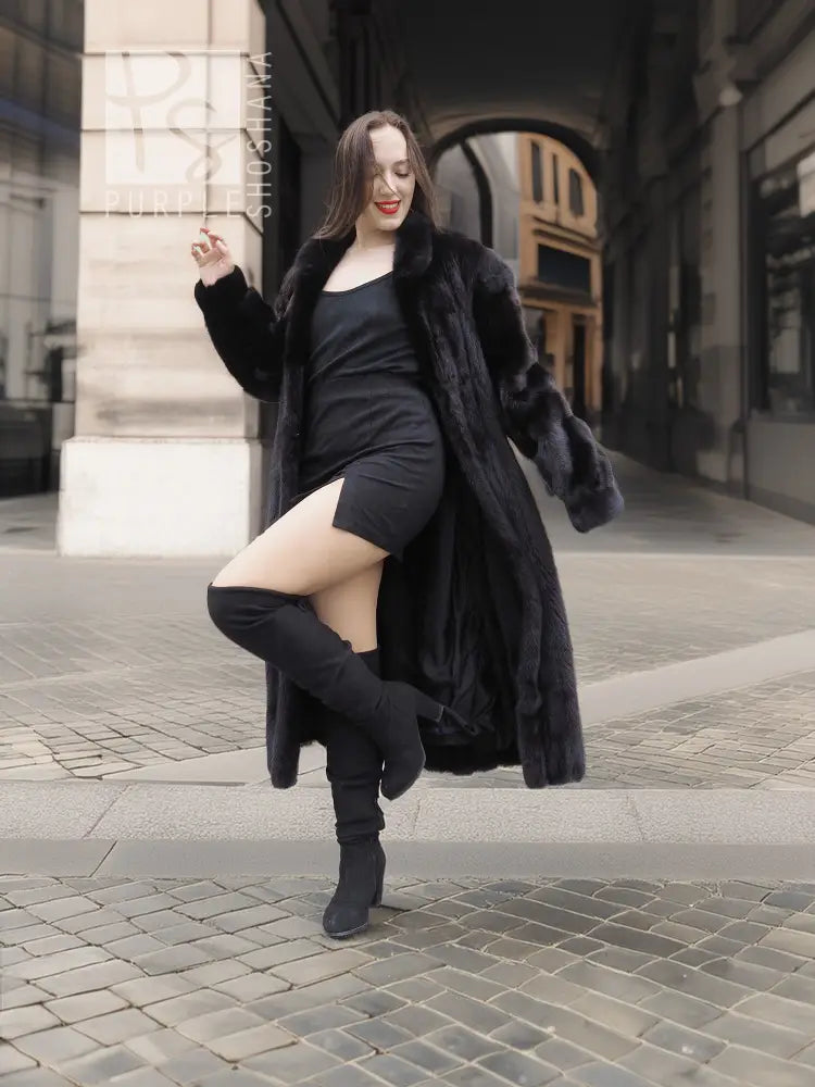 Black mink coat with fur hood and wide collar, long A-line hem