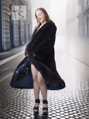 Black mink coat, long A-line silhouette with wide fur sleeves and slit hem