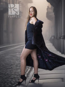Black mink coat, shoulder and arm-length fur wrap detail with dark fur trim.