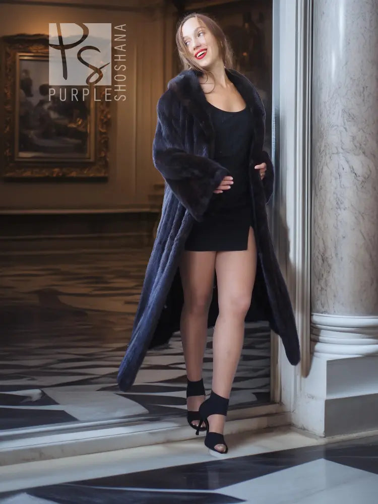 Black mink coat, long mid-calf length with plush fur texture and wide open front.