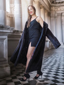 Black mink coat with open front, thigh slit, and wide cuffs