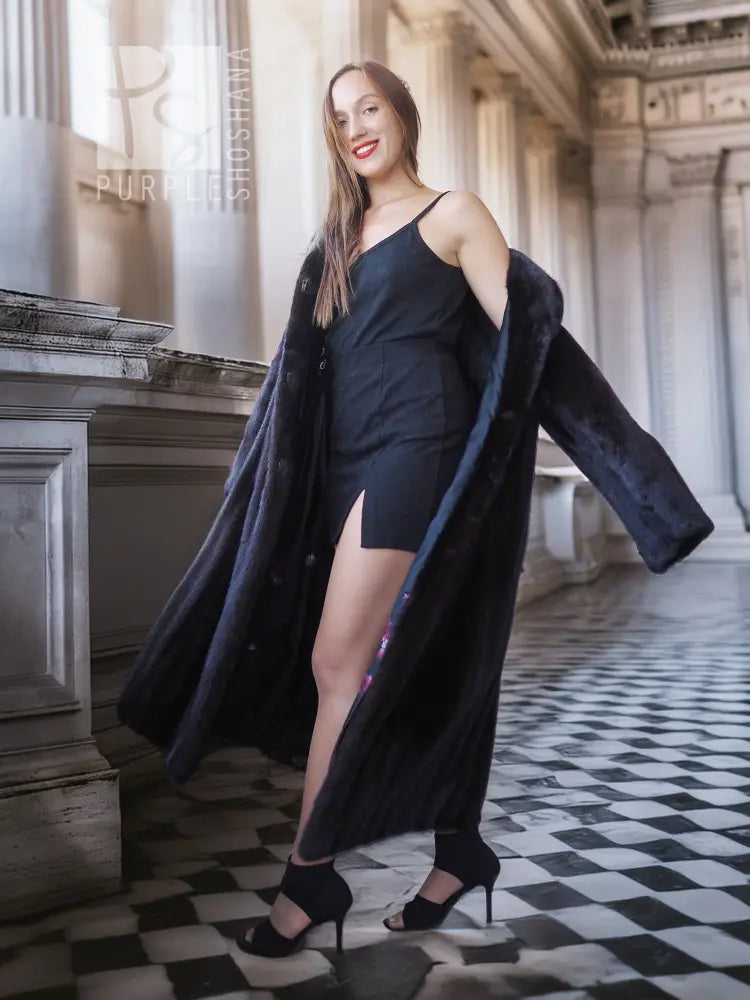 Black mink coat with open front, thigh slit, and wide cuffs
