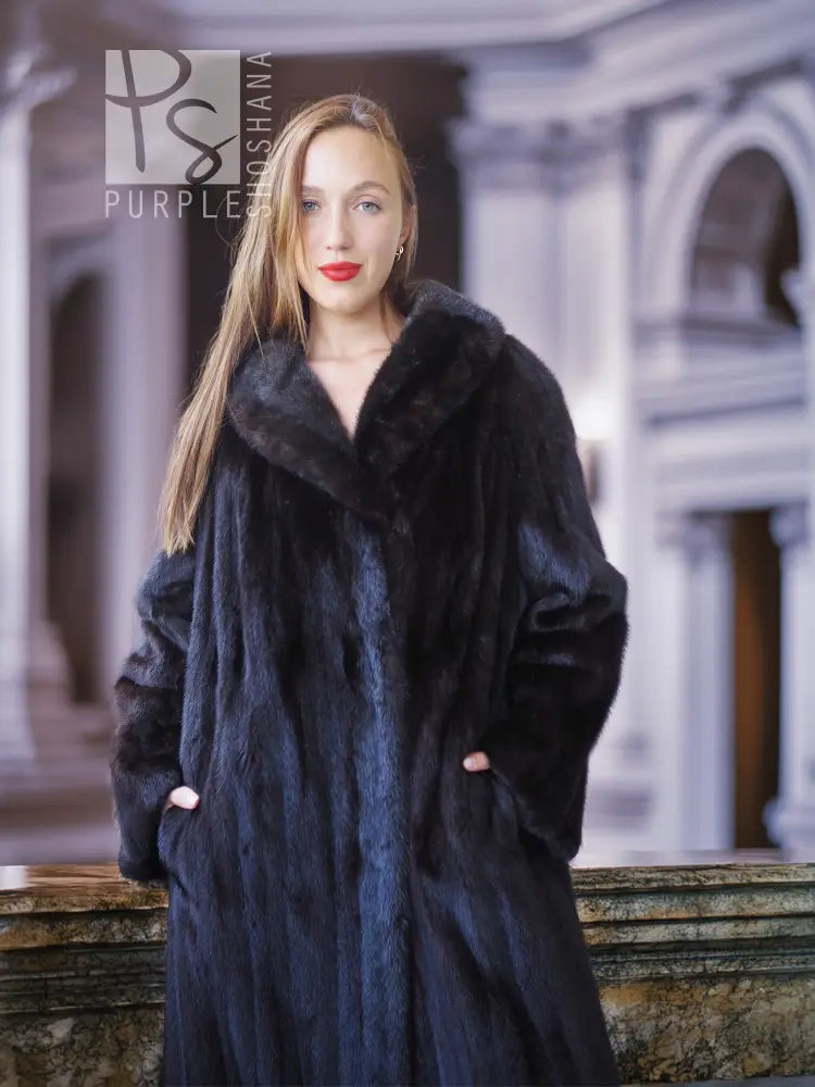Black mink coat with front button area and plush texture, front view