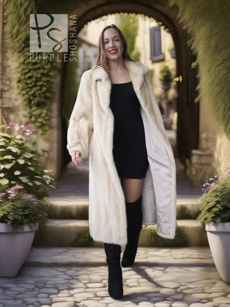 Light mink fur coat with soft collar and open front, styled over black clothing