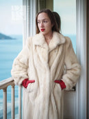 Cream mink fur coat front view, plush collar and long sleeves, relaxed fit