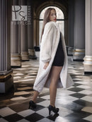 Long pale mink fur coat, side view, relaxed draped fit