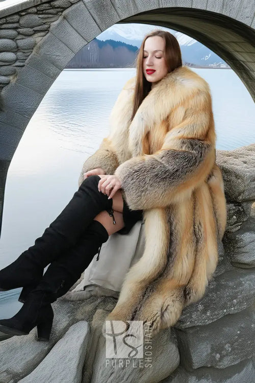 Golden island fox fur coat, long full-volume silhouette with gray fur cuffs at hem