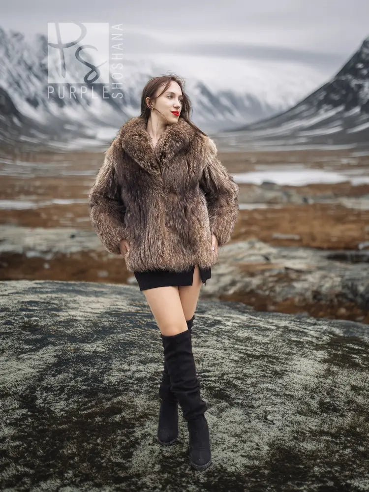 Brown faux-fur jacket with high collar and long sleeves, front view on a model.