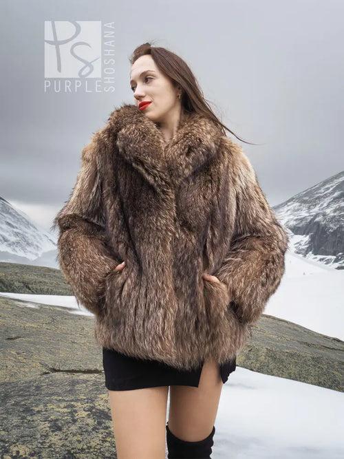 Brown faux-fur jacket with high collar, long sleeves, and front button closure.