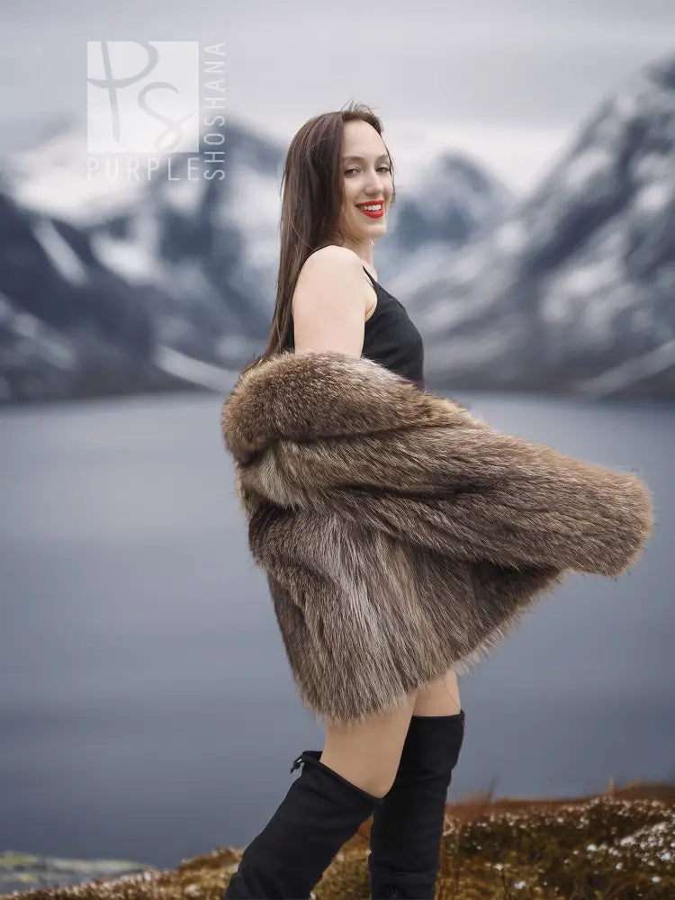 Raccoon-fur dream jacket, brown open-front with cropped sleeves.