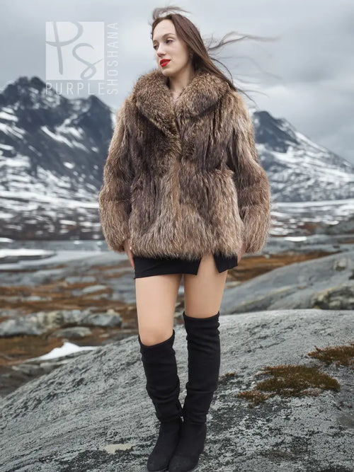 Brown shaggy fur jacket with open front, long sleeves, and high collar.