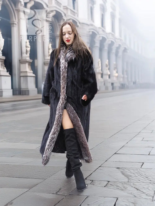 Black mink coat with silver fox trim, front slit and long length