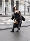 Black mink coat with silver fox fur collar, open front and long sleeves