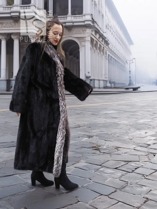 Black mink coat with silver fox collar, side view and wide sleeves