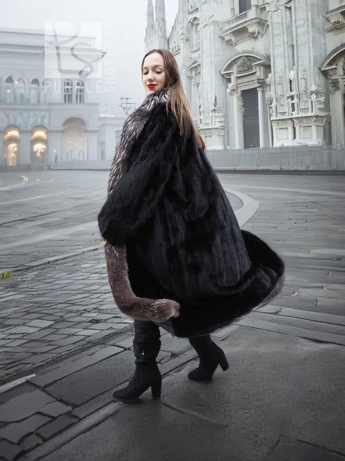 Black mink coat with silver fox collar, back view with wide skirt shape