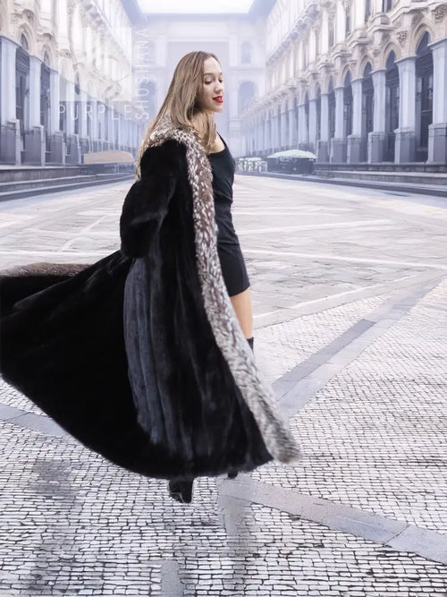 Black mink coat with silver fox trim, flared hem and long sleeves