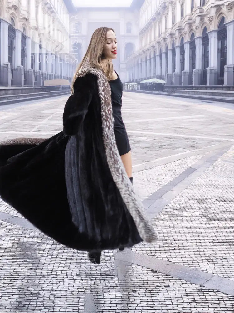 Black mink coat with silver fox trim, flared hem and long sleeves