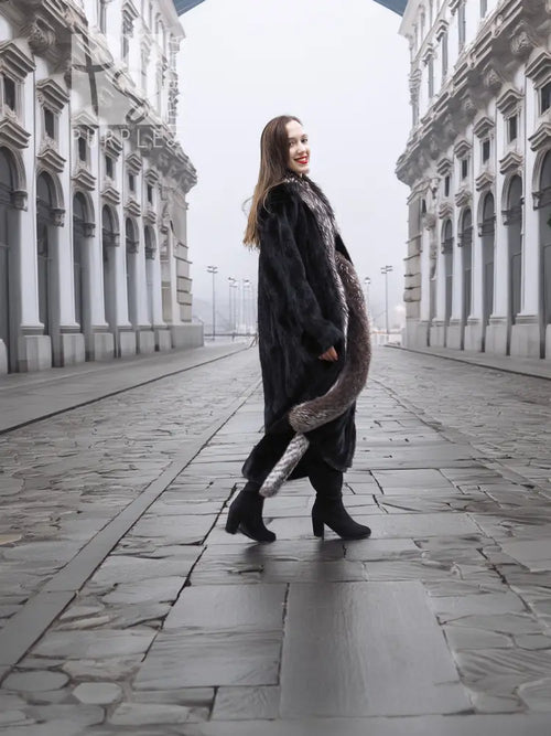 Black mink coat with silver fox trim, walking full-length portrait