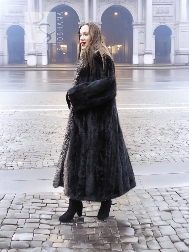 Full-length black mink coat with silver fox collar and swing hem