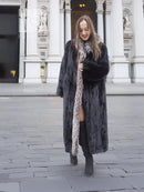 Black mink coat with silver fox collar, long sleeves and mid-calf length