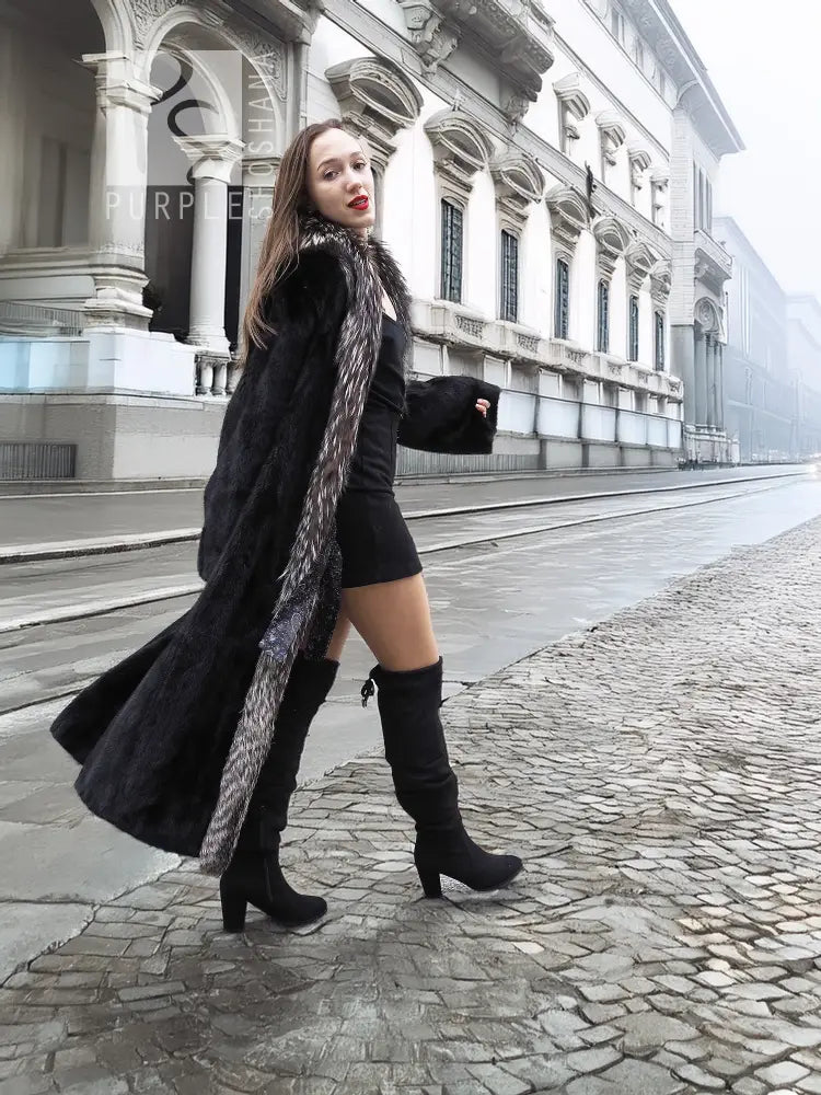 Black mink coat with flowing hem and silver fox fur collar, long sleeves