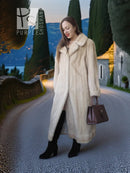 Ivory mink fur coat with shawl collar and long sleeves, relaxed standing pose