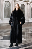 Black mink full-length coat with button front and high collar, long sleeves.