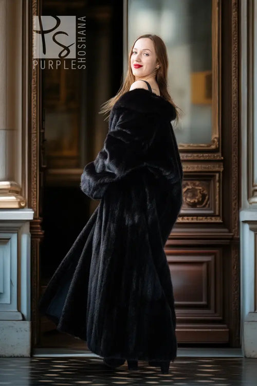 Black mink full-length coat with long sleeves and slightly flared hem