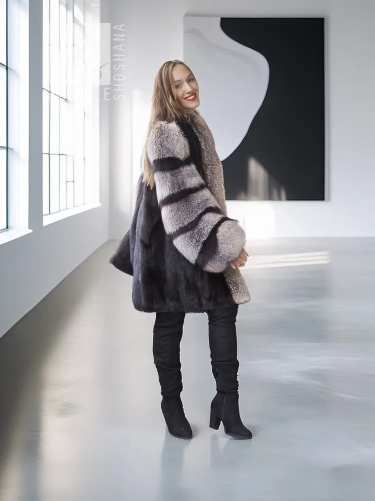 Mink fur jacket with gray fox-fur collar and striped sleeves, full-body side view.